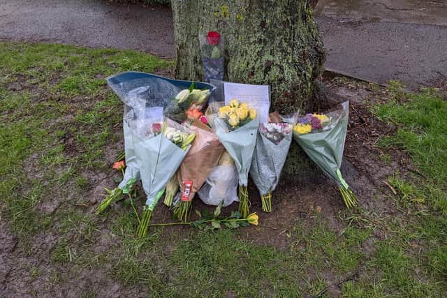 Bunches of flowers have been left outside the Howard Road home in Grimsbury, Banbury as tributes to Keith Green, who died late Sunday February 13 (photo by Roseanne Edwards)