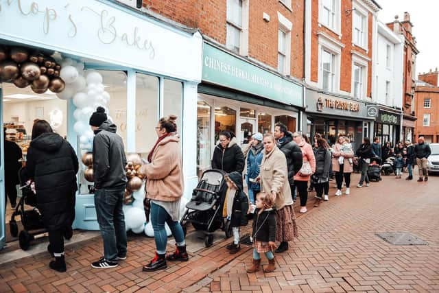 People queueing down the road outside Bishop's Bakes on its opening day Saturday February 18 (photo by Amandine Welbourn)