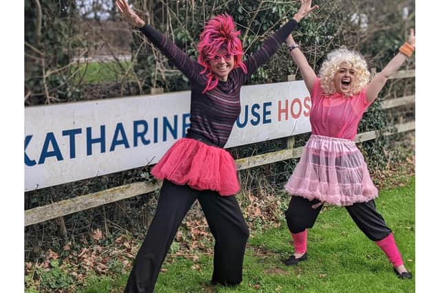 Hannah Lehman and Charlotte Bound from Katharine House getting warmed up for this year’s 80s themed Moonlight Walk event (photo from Katharine House Hospice)