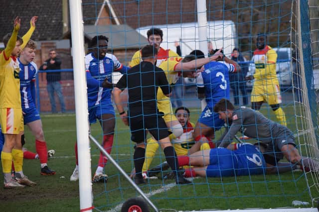 A goalmouth scramble in Banbury United's last game against Leiston   (Picture by Julie Hawkins)