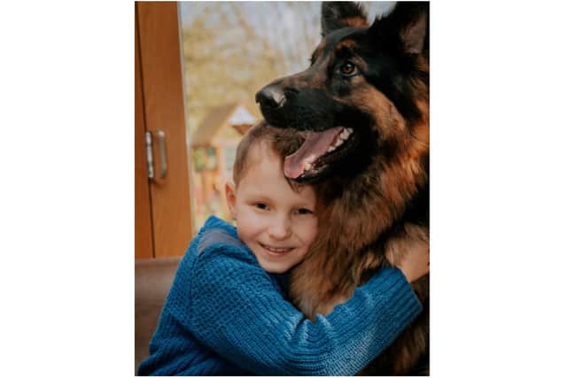 Freddie Croft with a family dog (photo from the family)