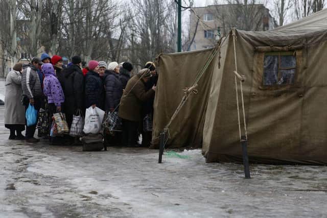 Ukrainians fleeing the conflict are in desperate need of items to help them as they set up temporary homes in tent villages. Picture by Getty