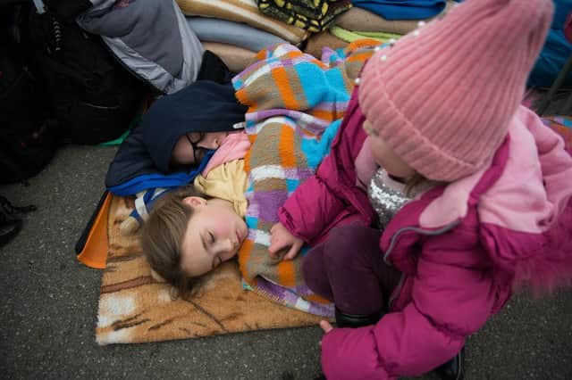 Shocked and traumatised Ukrainian families are living in tent villages along their country's borders. Picture by Getty