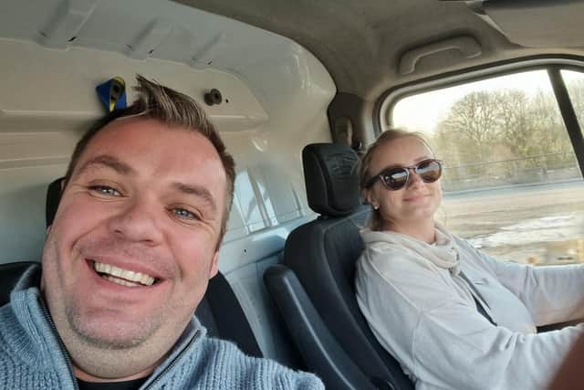 Beau and Caroline Willoughby are pictured on the road to Poland