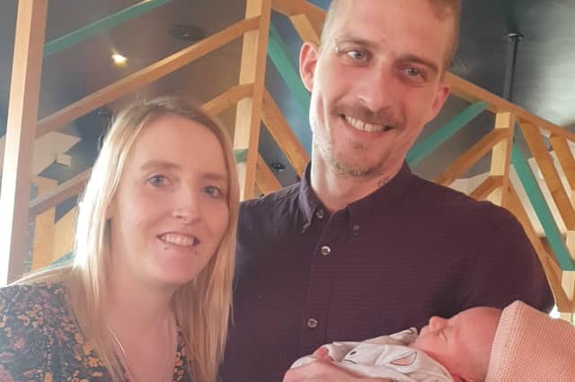 Carly Roberts with partner Matthew Thomas and baby Darcie