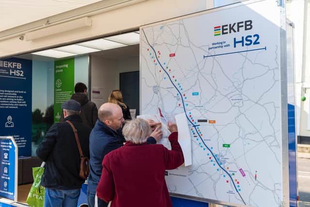 A member of EKFB's Community Engagement team with a member of the public at the external launch of EKFB's mobile visitor centre on March 8. (photo credit Jeff Russell with HS2)