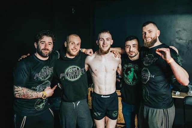 Pictured, from left, Gavin Stewart, Jonathan Lewis, Tyler Harding, Renas Jahwar and Chris Mee celebrate Precision MMAs victory in Wolverhampton