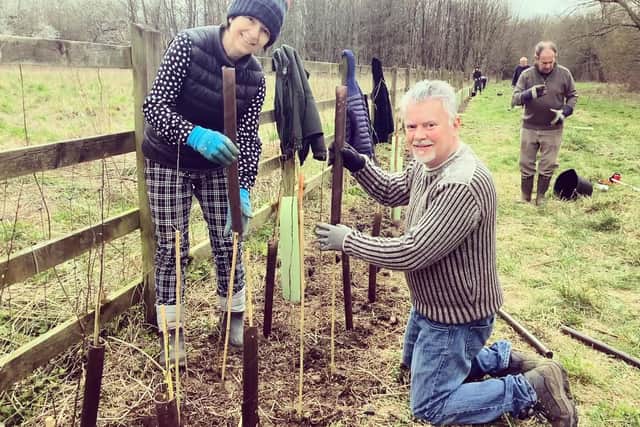 Volunteers plant a new hedge at Spiceball Park in Banbury (Photo by Tila Rodriguez-Past)