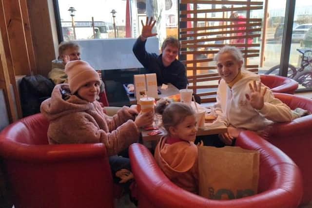 Fynn Watt treated a Ukrainian woman and her daughters to a meal at McDonald's on his 21st birthday during their from Poland to Vienna on Saturday March 12 (photo from Fynn)