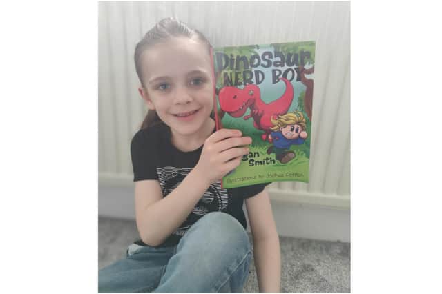 Six-year-old Logan Smith, from Banbury, has written and published his first comic book called Dinosaur Nerd Boy (photo from his mother, Samantha H.K. Smith)