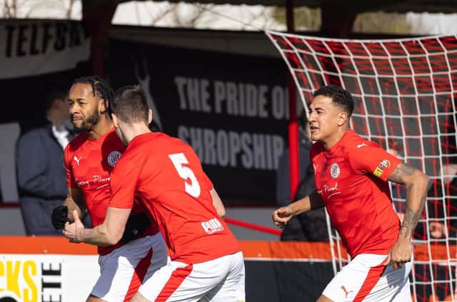 Jaanai Gordon celebrates after he scored his first goal for Brackley Town in last weekend's 2-1 win over AFC Telford United. Picture by Glenn Alcock