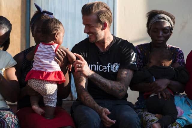David Beckham on a visit with UNICEF to Swaziland to see the work of the charity in action