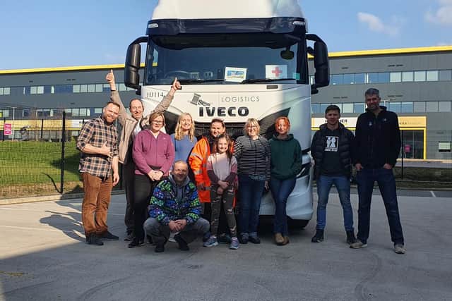 Volunteers for the Banbury for Ukraine group are pictured in front of the large articulated lorry that set off for Poland yesterday (Sunday) with donations to help the refugee crisis