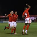 Lee Ndlovu celebrates scoring the only goal of the game in Brackley Town's win over Alfreton Town at St James Park on Tuesday night. Picture by Glenn Alcock