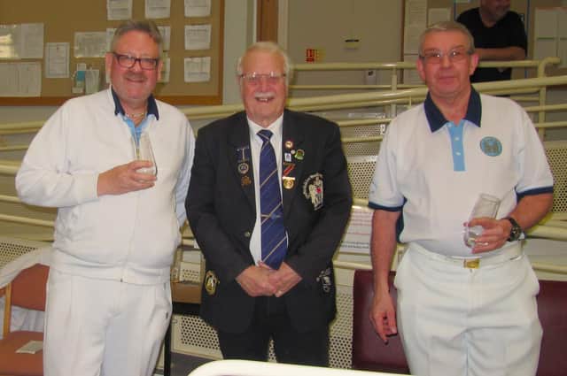Over 60s Pairs Winners (from left) John Cox, County President Michael Morris and Dave Lattimore