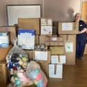 Boxed items from the Banbury Cross Health Centre with practice nurse Sue Hiam (submitted photo)