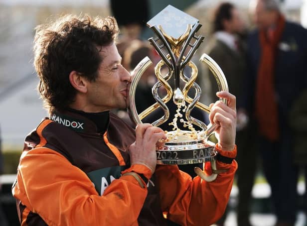 Sam Waley-Cohen kisses the Grand National trophy he dedicated to his late brother, Thomas. Picture by Getty