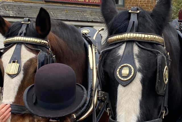 Commander and Lucas make horse-drawn deliveries to Hook Norton Brewery's pubs in the village