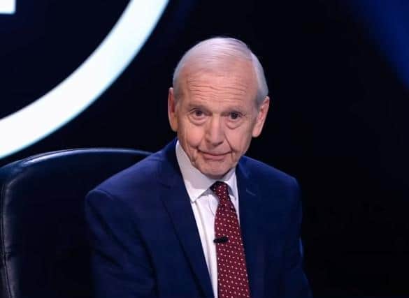 Quizmaster John Humphrys poses questions on the prog rock band King Crimson to Chipping Warden's Mark Rowbotham