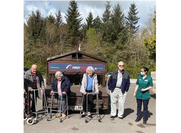 On National ‘Hug a Shed and take a Selfie Day’ the residents of a Chipping Norton care home were overjoyed to have a visit local legend - Kevin Nicks - the creator of the 'Fastest Shed.' (Image from Southerndown Care Home)