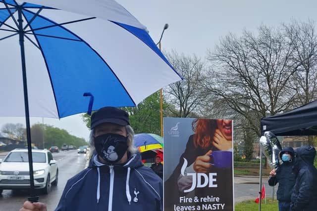 JDE workers demonstrate against 'fire and rehire' tactics being used by the company to cut costs and make the Banbury factory more competitive