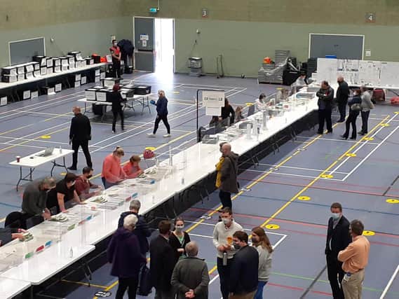 It was all-change in many of the 63 electoral divisions across Oxfordshire from the first result that came in. (Counting of the ballots at Spiceball Leisure Centre image from Cherwell District Council Twitter)