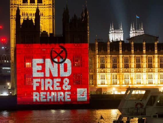 Unite the Union's End Fire and Rehire banner projected over the Houses of Parliament yesterday (Monday, May 10)