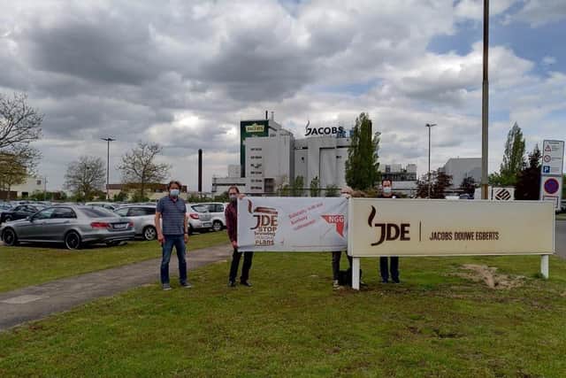 Staff at JDE's plant at Hemelingen near Bremen, Germany show their support for the Banbury 300