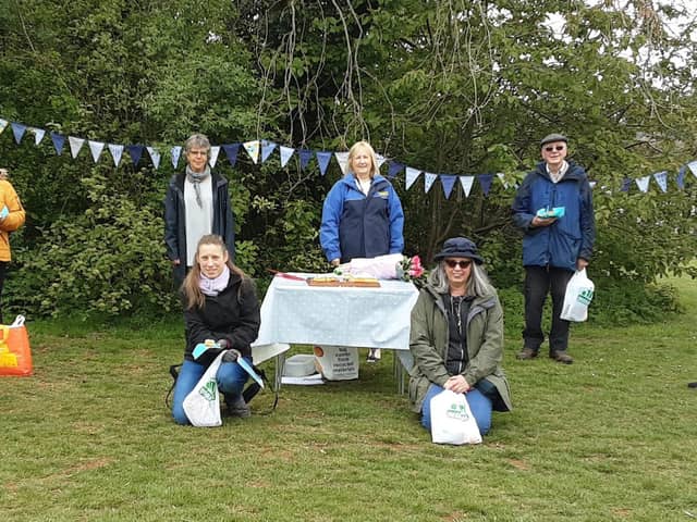 Supporters of the Sunshine Centre enjoy a celebratory cake at the end of the Walking Challenge