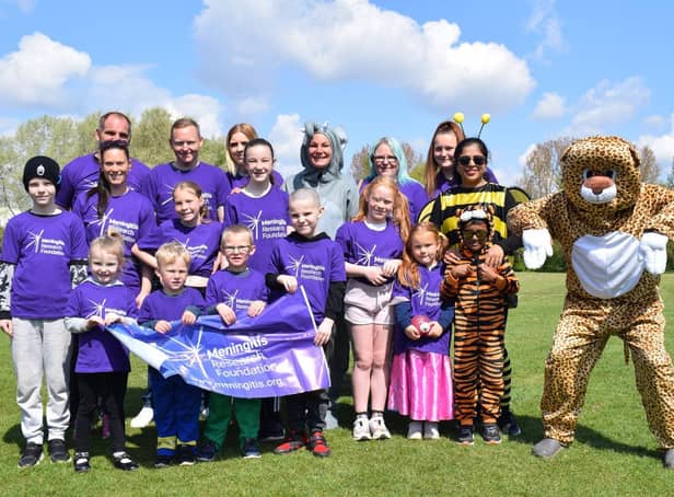 Kelly and Matt Hewitt teamed up with local hero Prabhu Natarajan and his family to complete 26 circuits of Spiceball Park to raise money for the charity,Meningitis Research Foundation.The group endured the challenge alongside family and friends dressed up in animal onesie costumes on Sunday, May 2.