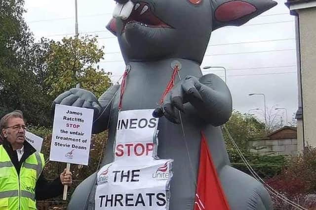 A giant inflatable called Scabby the Rat was displayed at Saturday's demonstration outside the JDE coffee factory