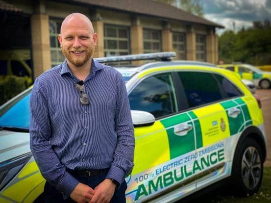 Gregory Edwards, vehicle commissioning unit manager, for South Central Fleet Services with some of the new fully electric emergency response vehicles