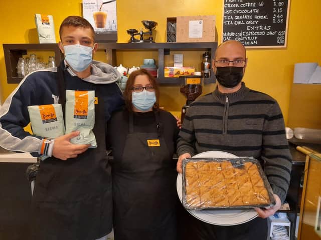 A new family owned cafe - Koukouvagia - serving authentic Greek food has opened in the Banbury town centre (pictured Dimitrios Mertikas his mother, Eleni Mouratidou, and Eleni's brother, Lazaros Mouratidis)