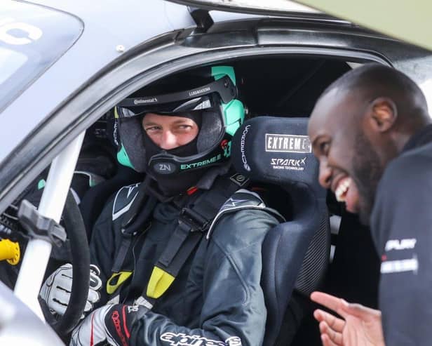 Prince William gets to know his Prodrive Extreme E car with guidance from performance engineer, George Imafidon