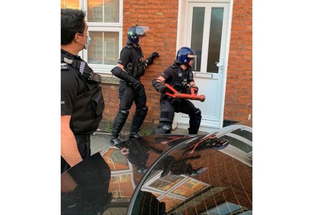 Thames Valley Police serve a warrant as part of county lines drugs investigation called 'Operation Judo' (Image from the TVP Cherwell Facebook page)