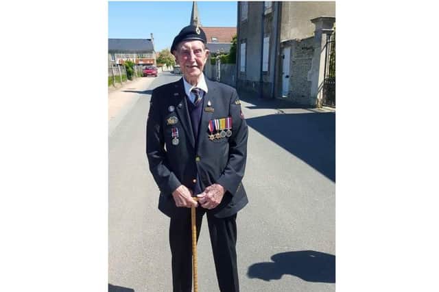 Henry Arthur McGill who served in World War Two is pictured wearing his service medals
