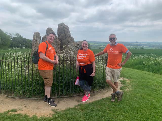 Members of the informal networking group, Business Buzz, have completed the Chipping Norton leg of a 90-mile net-walk of Oxfordshire in aid of Helen & Douglas House children’s hospice. (pictured: Team at The Rollright Stones - Paul Kielman of Kielman Mortgages, Katrina Sargent of Business Buzz HQ and Simon Gunn of Thunder design agency)