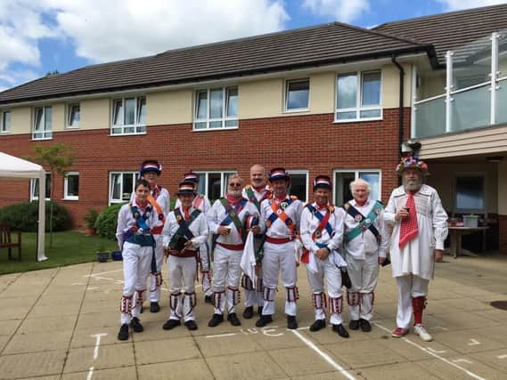Residents and staff at Juniper House Care Home in Brackley recently welcomed back Brackley Morris Men to their gardens.