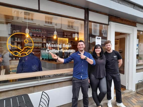 The Missing Bean coffee shop has opened in the Banbury High Street (Pictured: Staff members: Catalin Rusu and Laila Pipara and head of business development Silviu Rad.