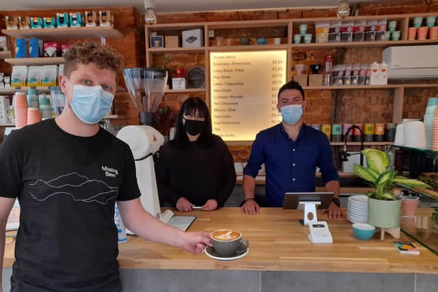 The Missing Bean coffee shop has opened in the Banbury High Street (Pictured: 
Head of Business Development Silviu Rad and staff members: Catalin Rusu and Laila Pipara