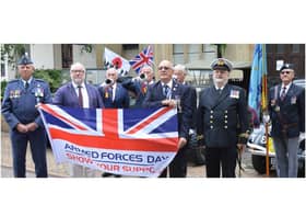 The armed forces flag was raised above Banbury Town Hall on Monday to mark the start of Armed Forces Week. Leader of Banbury Town Council and president of the Banbury branch of the Royal British Legion Kieron Mallon was joined by chairman of the Banbury RBL Chris Smithson and others.
Pictured: Colin Garnham-Edge, Cllr Kieron Mallon, bugler Chris Page, bugler Don Claridge. Chris Smithson, bugler Mike Neal, Tony Ingram of Oxford Sea Cadets, and standard bearer Anthony Smith RAFA.