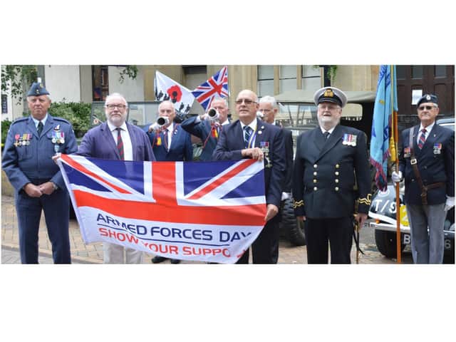 The armed forces flag was raised above Banbury Town Hall on Monday to mark the start of Armed Forces Week. Leader of Banbury Town Council and president of the Banbury branch of the Royal British Legion Kieron Mallon was joined by chairman of the Banbury RBL Chris Smithson and others.
Pictured: Colin Garnham-Edge, Cllr Kieron Mallon, bugler Chris Page, bugler Don Claridge. Chris Smithson, bugler Mike Neal, Tony Ingram of Oxford Sea Cadets, and standard bearer Anthony Smith RAFA.