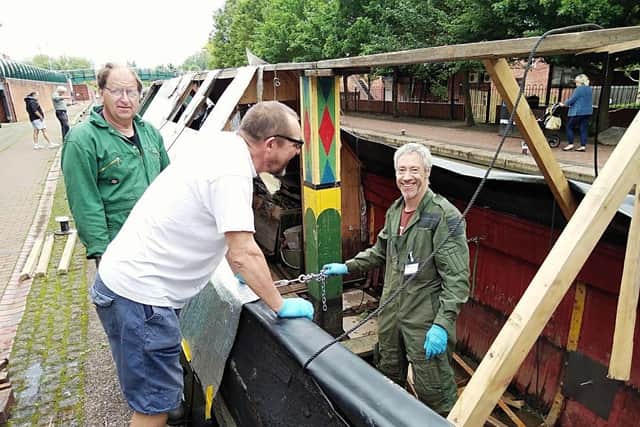 People work on a boat at Tooley's Boatyard (submitted image)