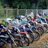 Motocross competitors line up at the start of a race at Wroxton