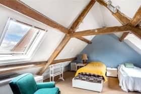 This grade II listed home -Dolphin House - with period features such exposed ceiling beams has come on the market in the village of Deddington near Banbury