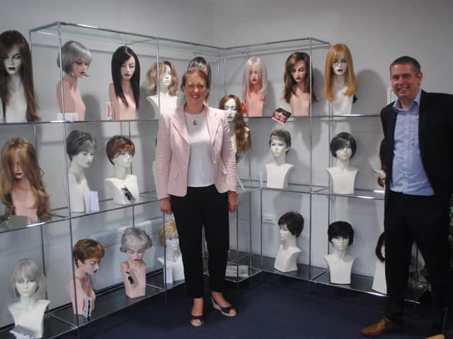 Victoria Prentis, MP for North Oxfordshire, visited Banbury Postiche, the UK’s oldest wig making supplies company, to mark its centenary celebrations. She's pictured with the company's owner, Nick Allen (Submitted photo from Banbury Postiche)