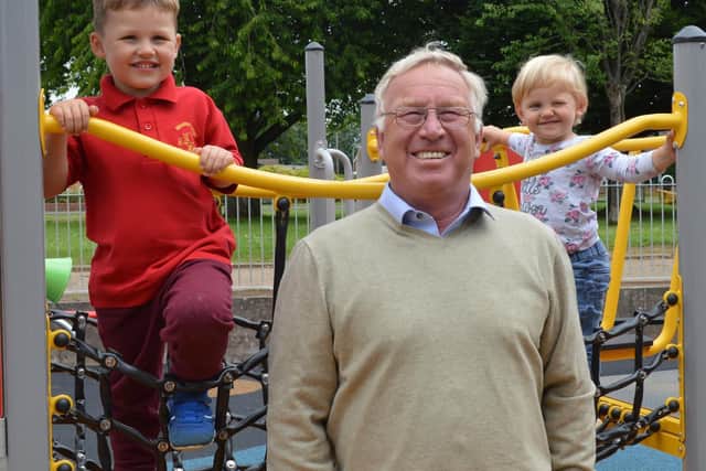 Ollie (3) and Becky (2) Buckle, who live locally, have been watching the new
playground take shape and they were excited to try the climbing frame when they
joined Cllr Colegrave at the opening. Photo from Banbury Town Council.