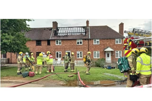 Northamptonshire firefighters tackle a house fire in the village of Byfield Monday afternoon (July 5) Image from @sailingbikeruk on Twitter.