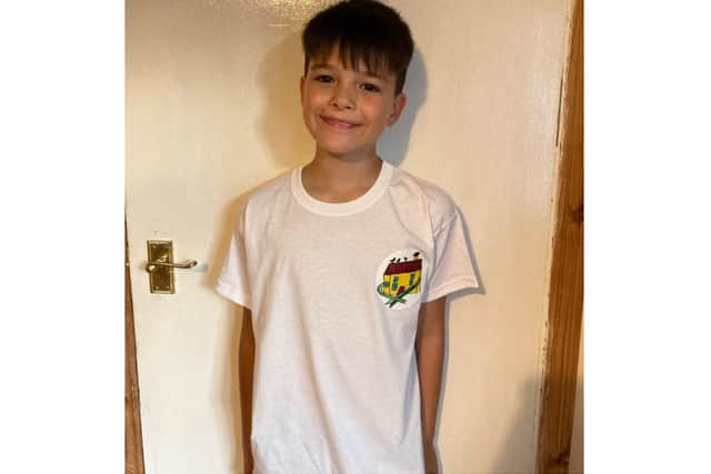 Ten-year-old Mitch, the son of Lara McDonagh, who works at the Three Pigeons Inn pub, designed a charity T-shirt which will be sold on Friday night July 16 for £7.50 each. (Image from Lara McDonagh)