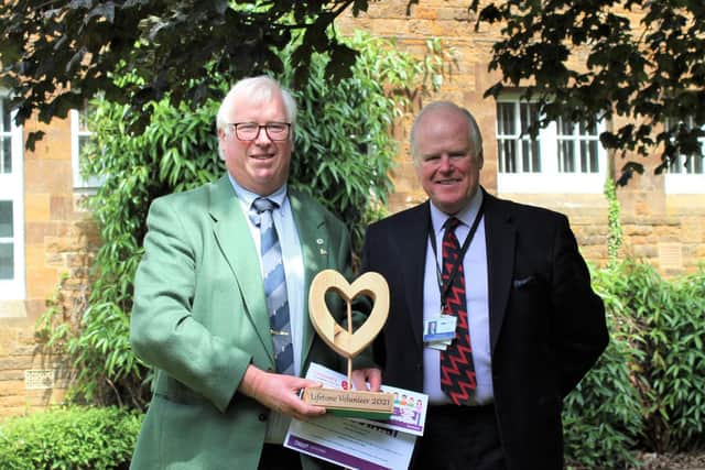 George Dumbleton, who received the Lifetime Volunteer of the Year award, is pictured with Cllr Andrew McHugh (Submitted image from Sanctuary)